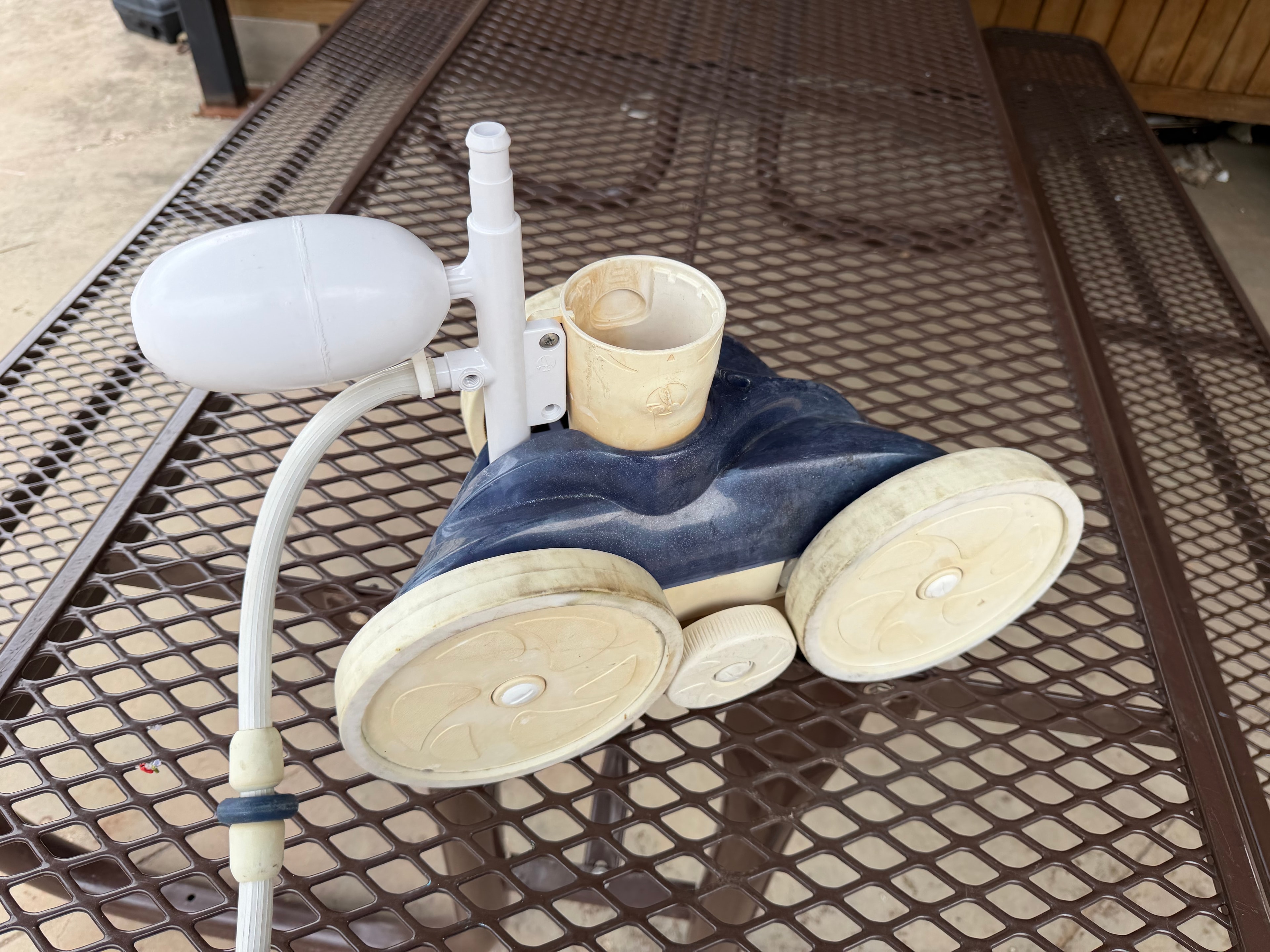 Pool cleaner fully reassembled and ready to return to service after repair